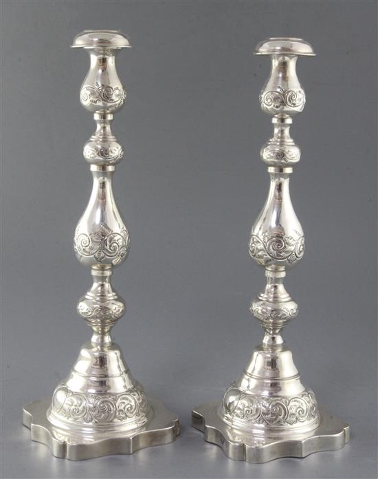 A pair of George V silver Sabbath Day candlesticks by Rosenzweig, Taitlebaum & Co, 20.3 oz.